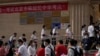 資料照：2022年6月7日，中國高考第一天，北京考生進入考場。