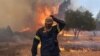 A Firefighter in the line of duty.