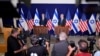 U.S. Secretary of State Antony Blinken and Israel’s Prime Minister Benjamin Netanyahu make statements to the media inside The Kirya, which houses the Israeli Ministry of Defense, after their meeting in Tel Aviv, Israel, Oct. 12, 2023.