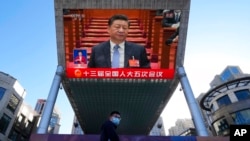 2022年3月5日中國人大開幕式上的習近平。 -資料照