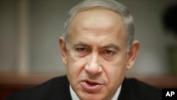 Israeli Prime Minister Benjamin Netanyahu attends the weekly cabinet meeting in Jerusalem Jan. 20, 2013.