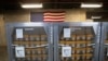 FILE - Cages of ventilators, part of a shipment of 400, arrive at the New York City Emergency Management Warehouse, March 24, 2020. 