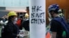 香港示威者2019年7月1日冲进立法会后在柱子上书写“香港不是中国”的字样。