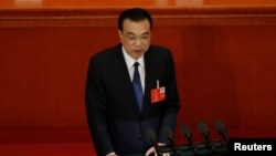中國總理李克強在北京人大會堂舉行的全國人大年度會議開幕式上講話。（2020年5月22日）
