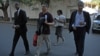 Mozambique - Convicted murderer Vicente Ramaya on his release. On his left without a tie is his lawyer Abdul Gani
