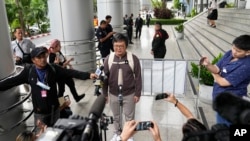 泰國著名人權律師阿農‧南帕(Arnon Nampa) 2023年9月26日抵達刑事法庭聽取判決。