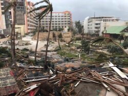 FILE - Destruction lies in the wake of Hurricane Irma in St. Martin, Sept. 6, 2017.