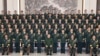 中共總書記、中共中央軍委主席習近平2024年12月12日與駐澳門特別行政區的中國人民解放軍（解放軍）軍人代表合影。