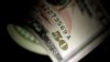  FILE - A $1 note is seen in this June 22, 2017, photo.