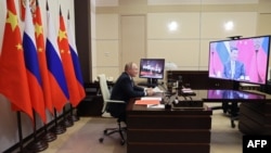 俄羅斯總統普京在莫斯科與中國領導人習近平舉行在線中俄首腦峰會。 （2021年12月15日）