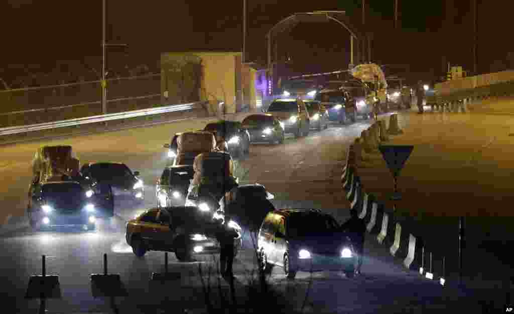 South Korean vehicles returning from North Korea's Kaesong arrive at the customs, immigration and quarantine office near the border village of Panmunjom, in Paju, South Korea, April 30, 2013.