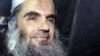 In this April 17, 2012 photo, Abu Qatada is driven away after being refused bail at a hearing at London's Special Immigration Appeals Commission.