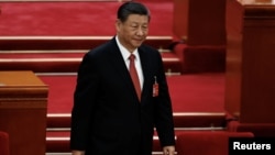 資料照片: 2024 年3月11日習近平於抵達中國北京人民大會堂出席全國人民代表大會閉幕會議