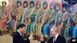 中國國家主席習近平2023年3月21日在莫斯科會見俄羅斯總統普京。（美聯社）