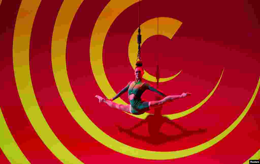 An artist performs before the ahead of the Euro 2020 Finals Draw football competition in Bucharest, Romania, Nov. 30, 2019.