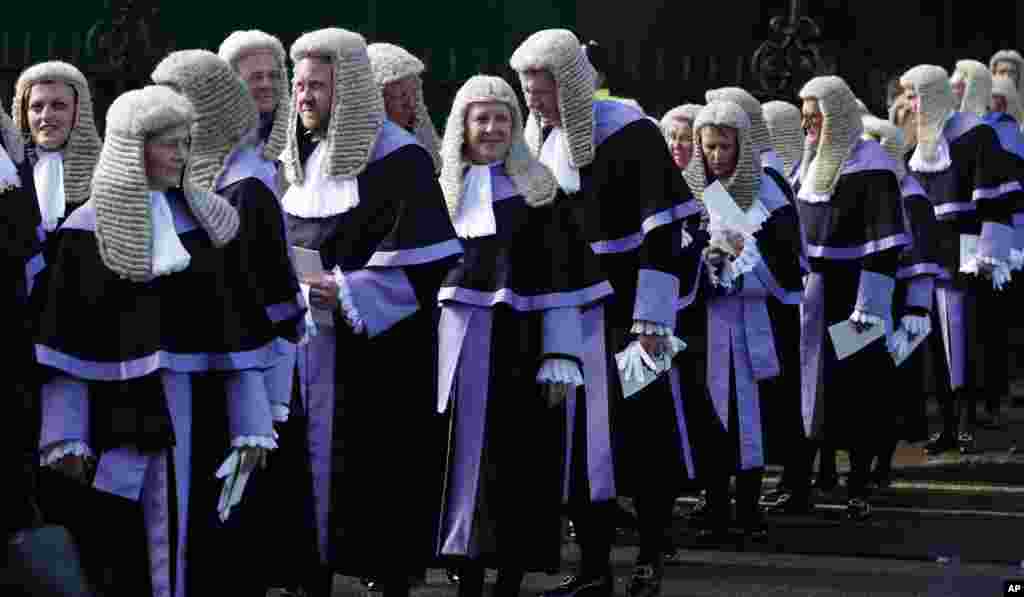 Some of Britain's most senior judges take part in the Annual Judge's Service, as they cross the road from Westminster Abbey to the Houses of Parliament in London.