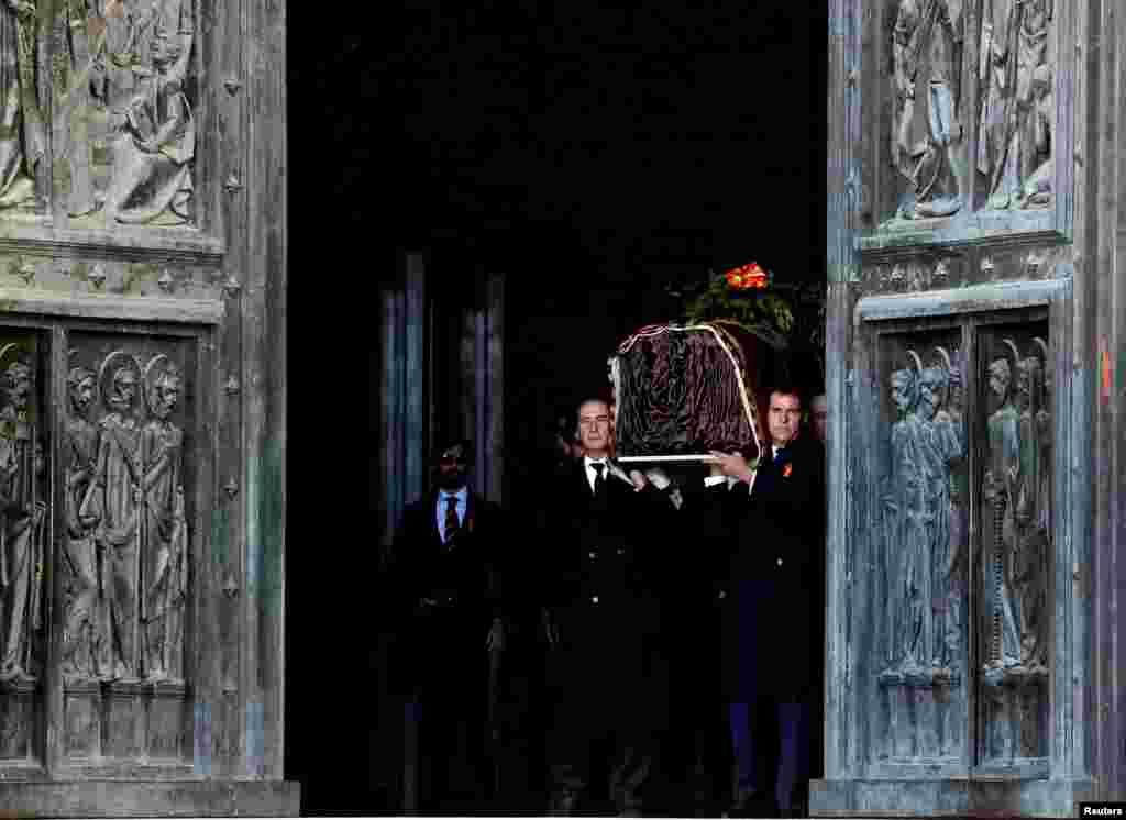Late Spanish dictator Francisco Franco's relatives carry his coffin after the exhumation at The Valle de los Caidos (The Valley of the Fallen) in San Lorenzo de El Escorial, Spain.