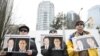 加拿大民眾2019年3月6日在溫哥華法院外呼籲中國釋放被拘押的兩名加拿大公民。 （2019年3月6日）