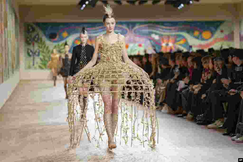 A model presents a dress at the Christian Dior Haute Couture Spring Summer 2025 collection show in Paris, France.