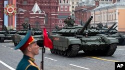 Russian T-72 B3 tanks drive during the Victory Day military parade to mark 74 years since the end of Wolrd War II, in Red Square in Moscow, Russia, May 9, 2019.