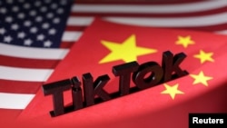 TikTok標識與美國與中國國旗。 （路透社示意圖）