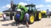 While Stock Market Soars, US Farmers Struggle