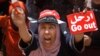 An Egyptian protester shouts slogans during a demonstration against Egypt's Islamist President Mohammed Morsi in Tahrir Square in Cairo, July 1, 2013.