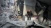 Consequências de um ataque israelita a uma casa na cidade de Gaza