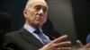 Former Israel Prime Minister Ehud Olmert speaks during an interview with AP in Tel Aviv, Israel, Thursday, April 18, 2013.