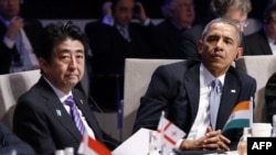 美國總統奧巴馬和日本首相安倍晉三星期一在海牙出席安全峰會